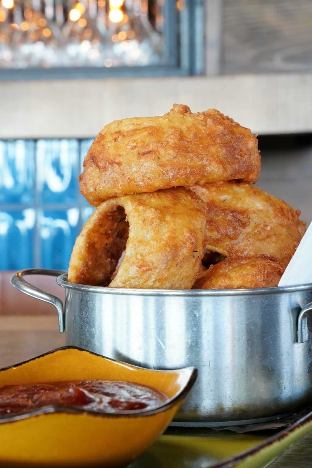 Order Beer Battered Onion Rings food online from Jimmy Famous American Tavern store, San Diego on bringmethat.com