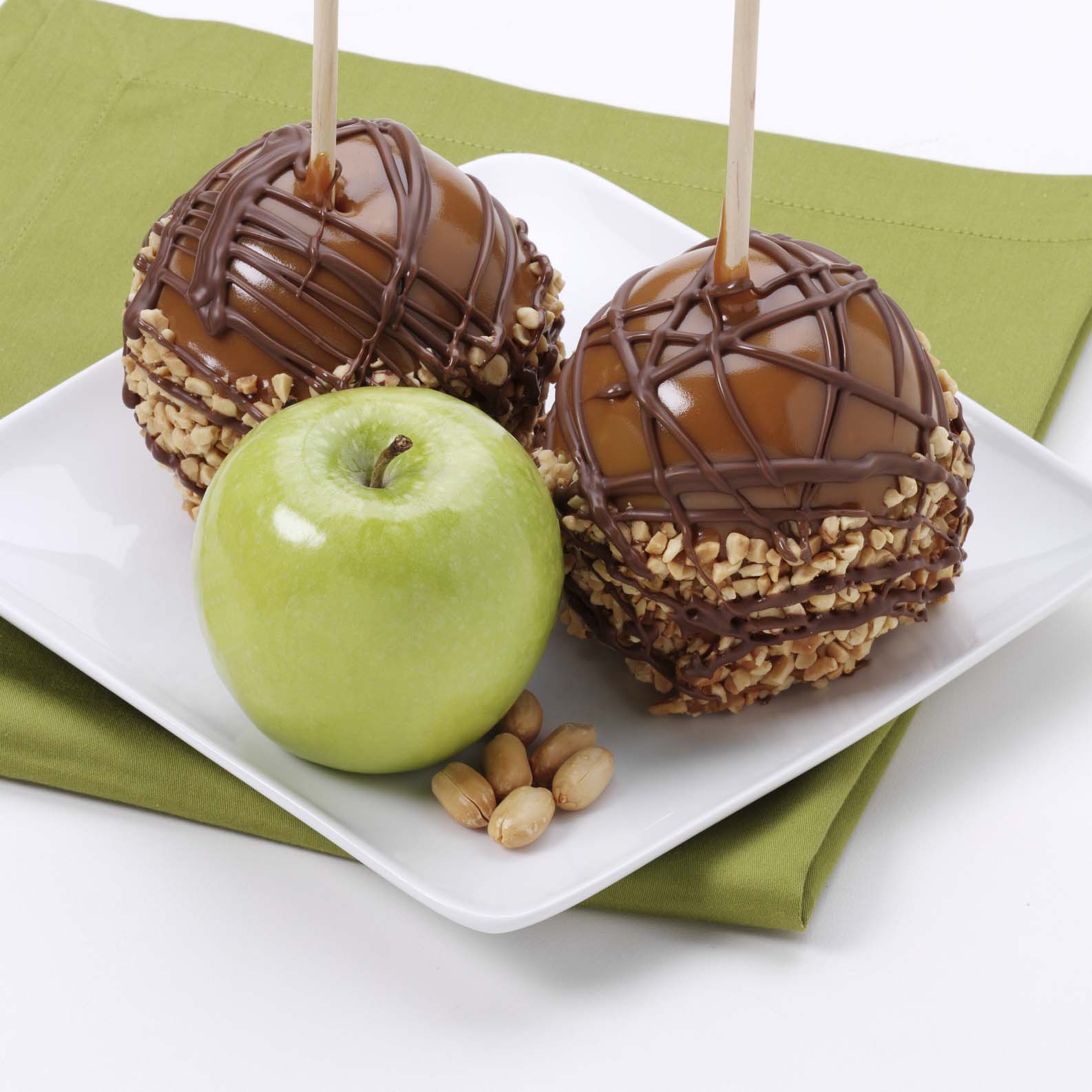Order Caramel Apple with Chocolate and Peanuts food online from Russell Stover Chocolates store, Omaha on bringmethat.com