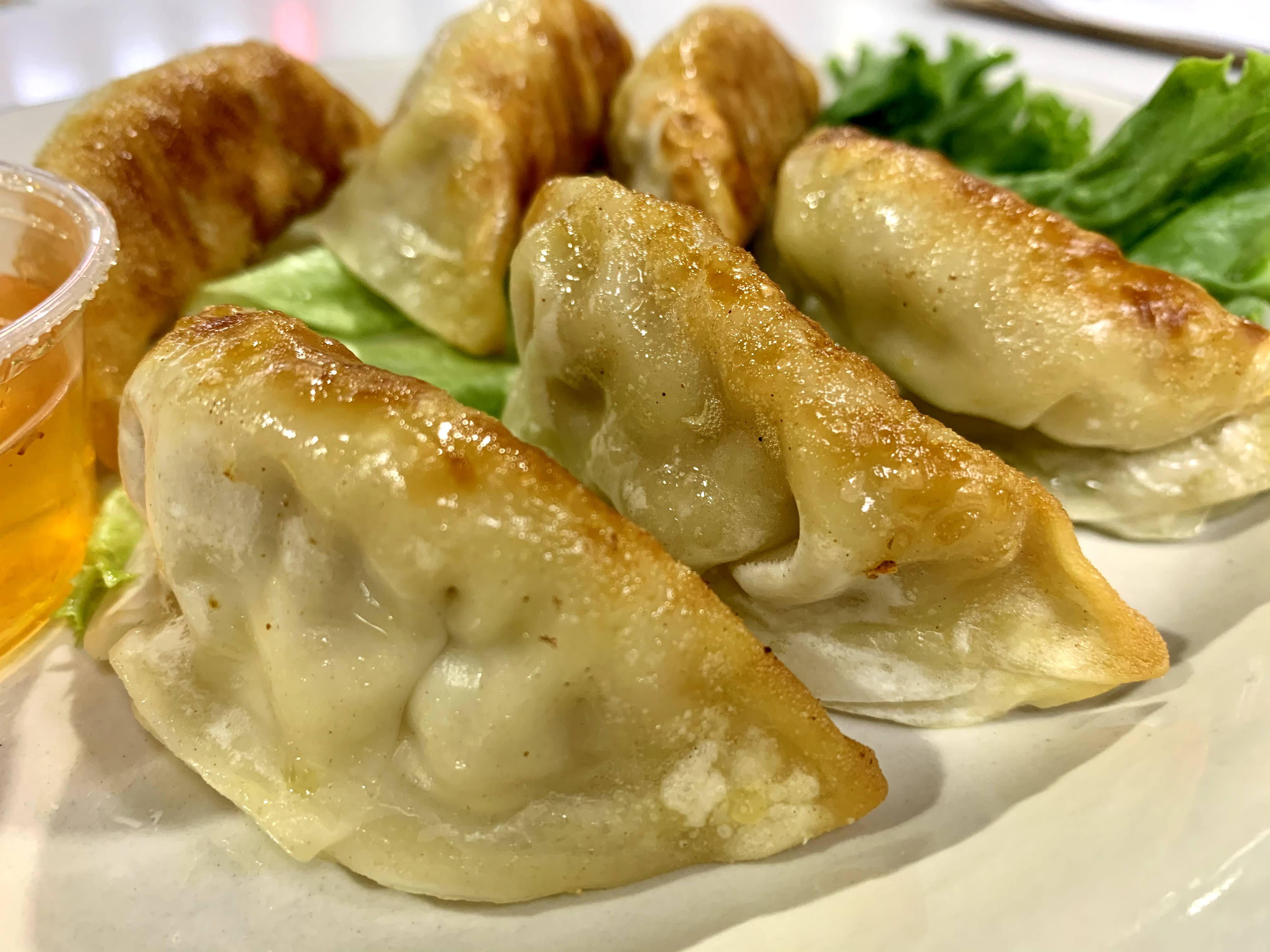 Order 8E. Pot Stickers (6) food online from Thai Noodles Cafe store, Libertyville on bringmethat.com