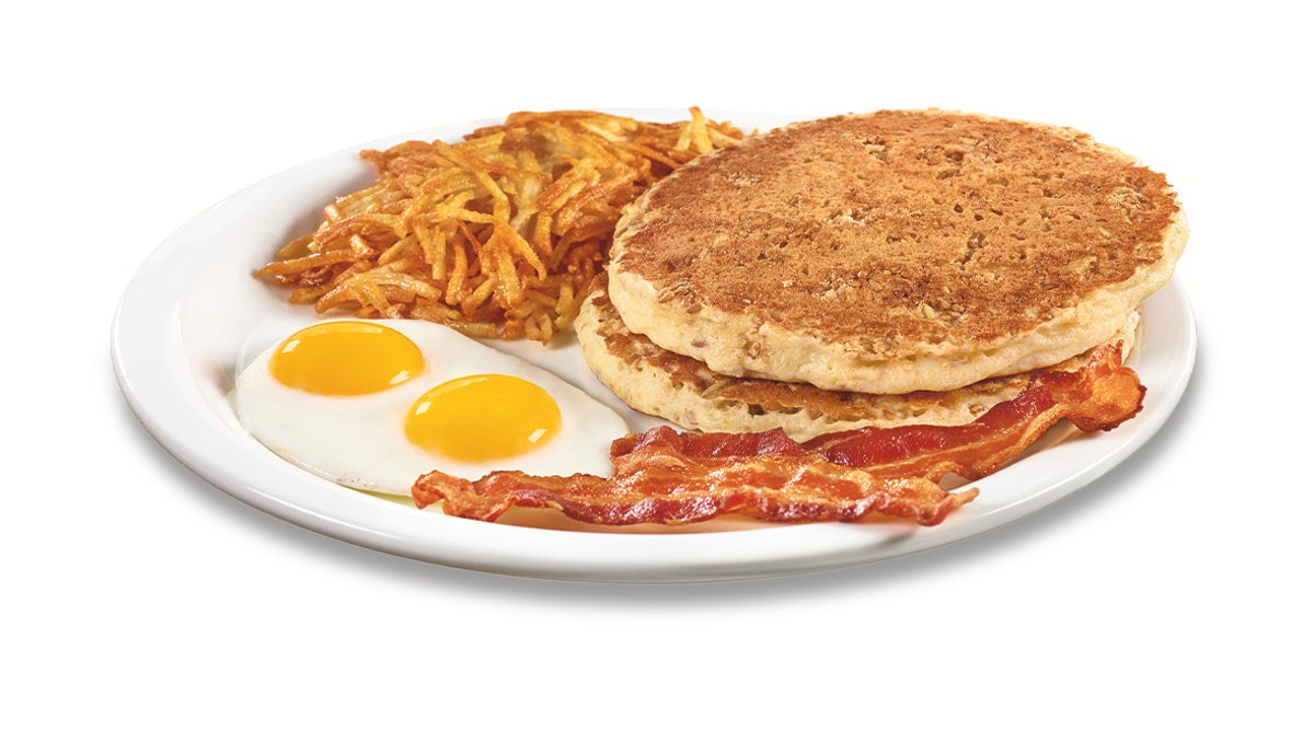 Order Hearty 9-Grain Pancake Breakfast  food online from Denny store, Albuquerque on bringmethat.com