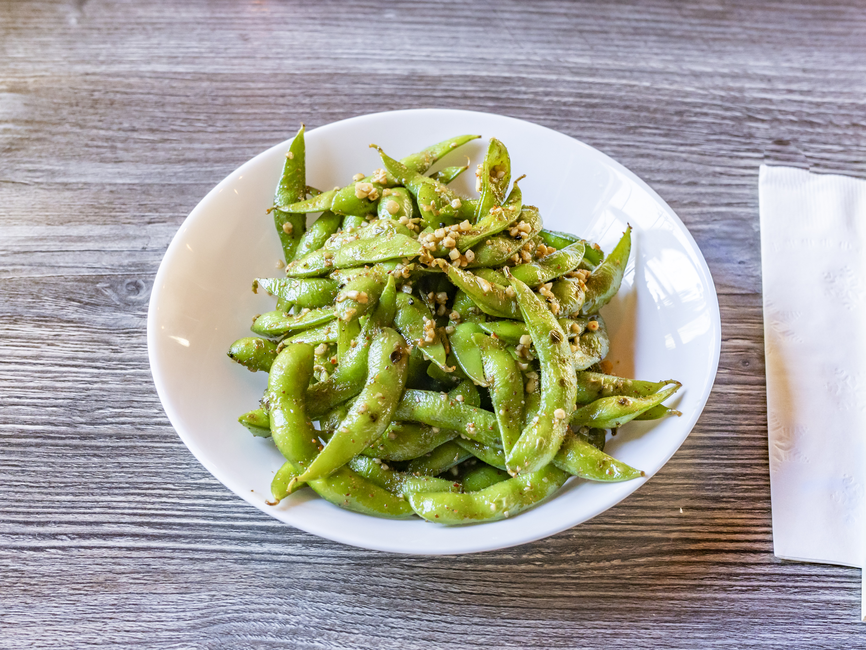 Order Spicy Garlic Edamame food online from Nozomi 2 Sushi And Bbq store, La Jolla on bringmethat.com