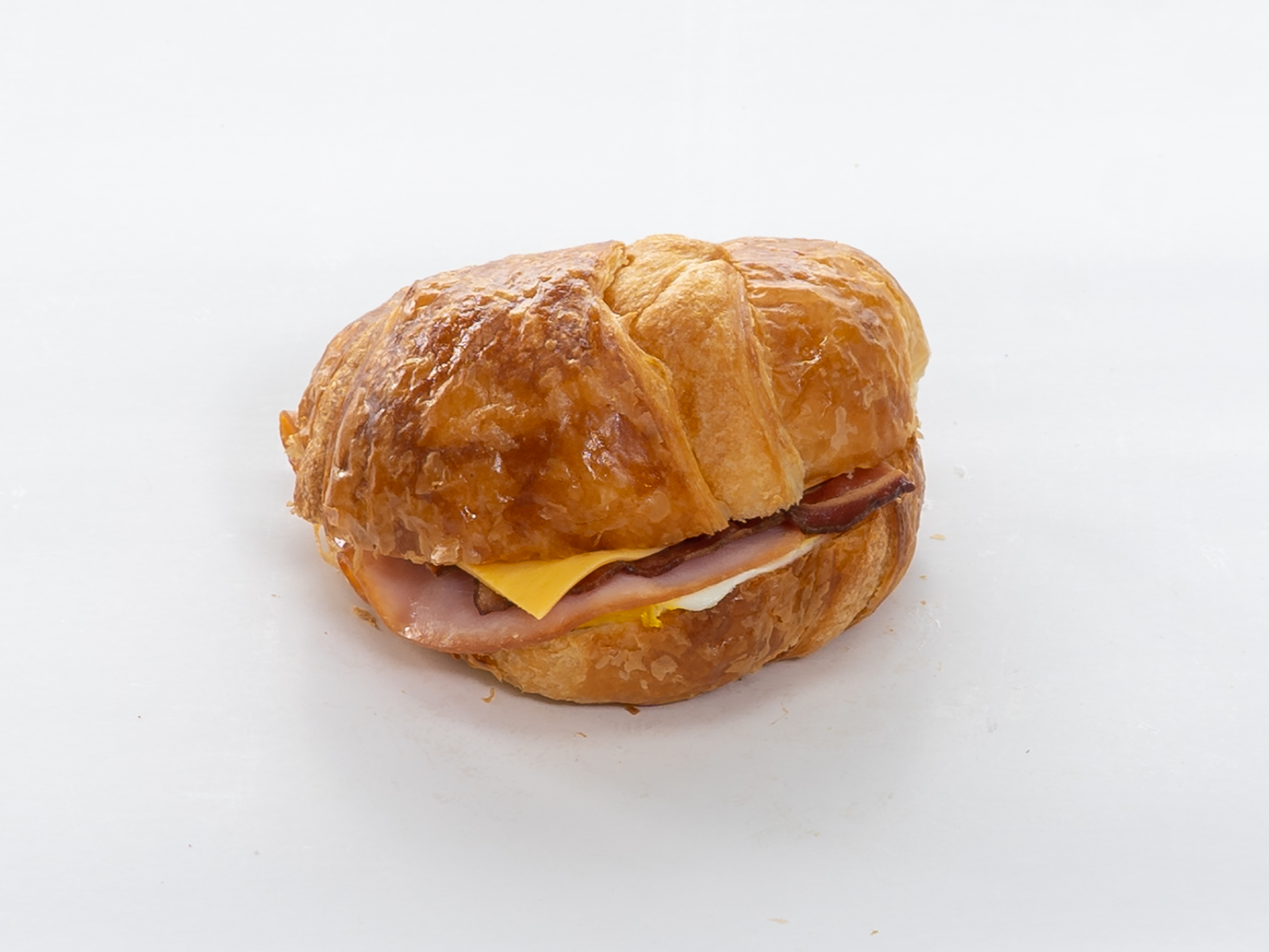 Order Bacon, Ham, Egg and Cheese Sandwich food online from Moon's Donuts store, Irving on bringmethat.com