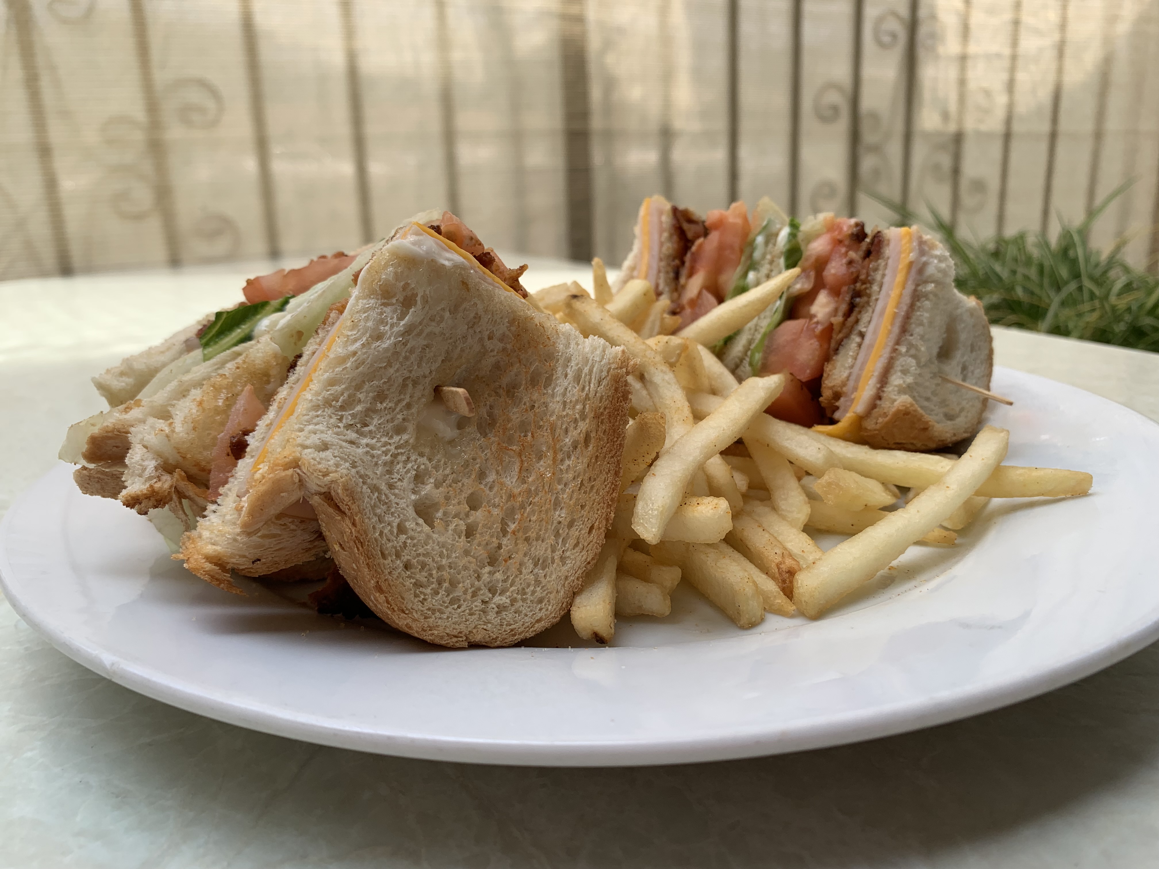 Order Club Sandwich food online from Puerto Nuevo Restaurant store, Los Angeles on bringmethat.com