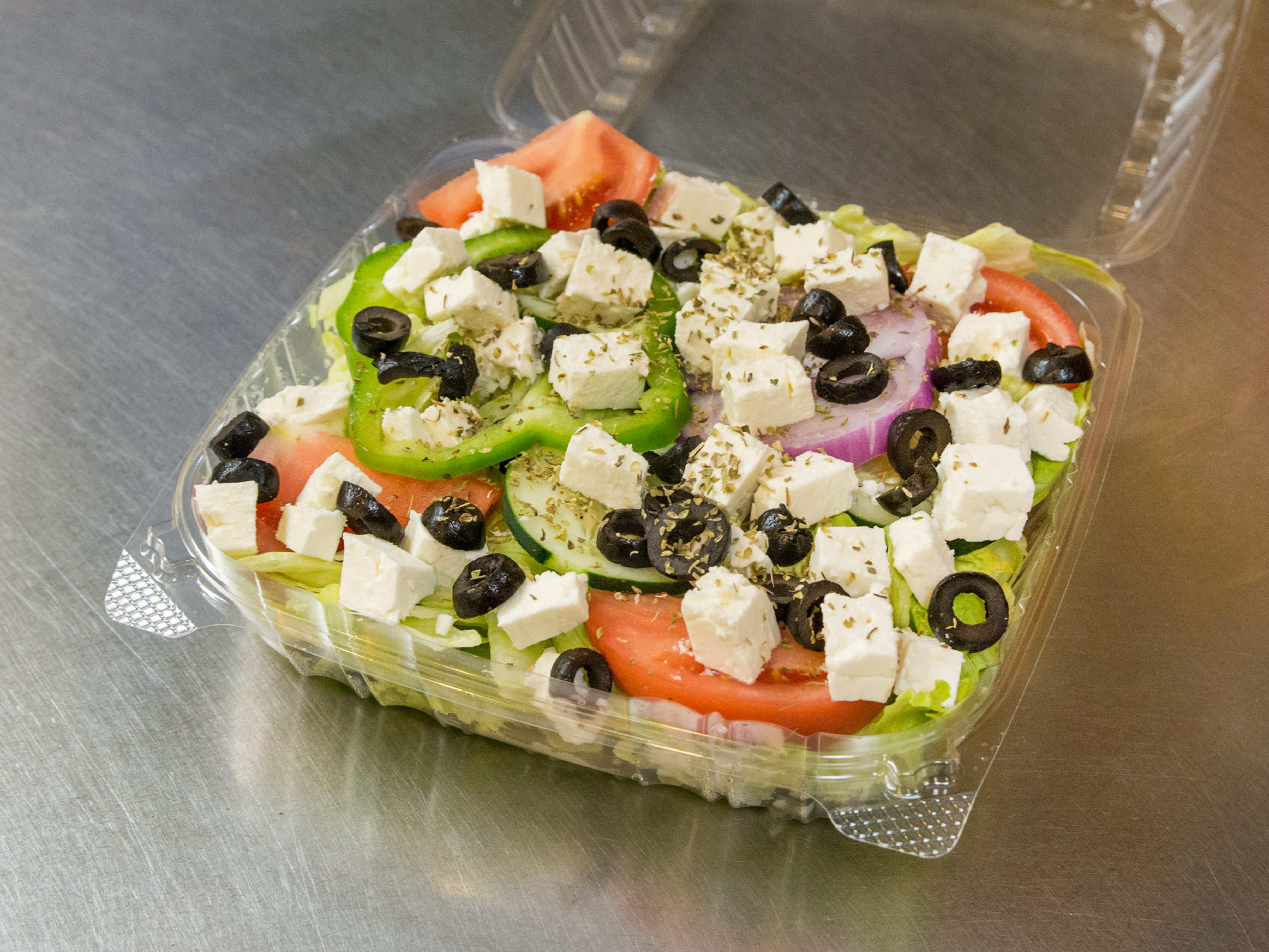 Order Greek Salad food online from Pizza Ravens store, Glen Burnie on bringmethat.com