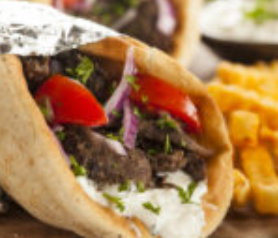 Order Traditional Gyro on Pita food online from Caffe Opa store, Fayetteville on bringmethat.com