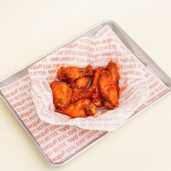 Order .6 TRADITIONAL WINGS * food online from Mad Chicken store, Milwaukee on bringmethat.com