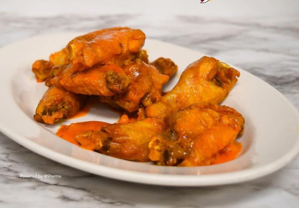 Order Wings - 10 Pieces food online from Johnny Pizza store, Brooklyn on bringmethat.com