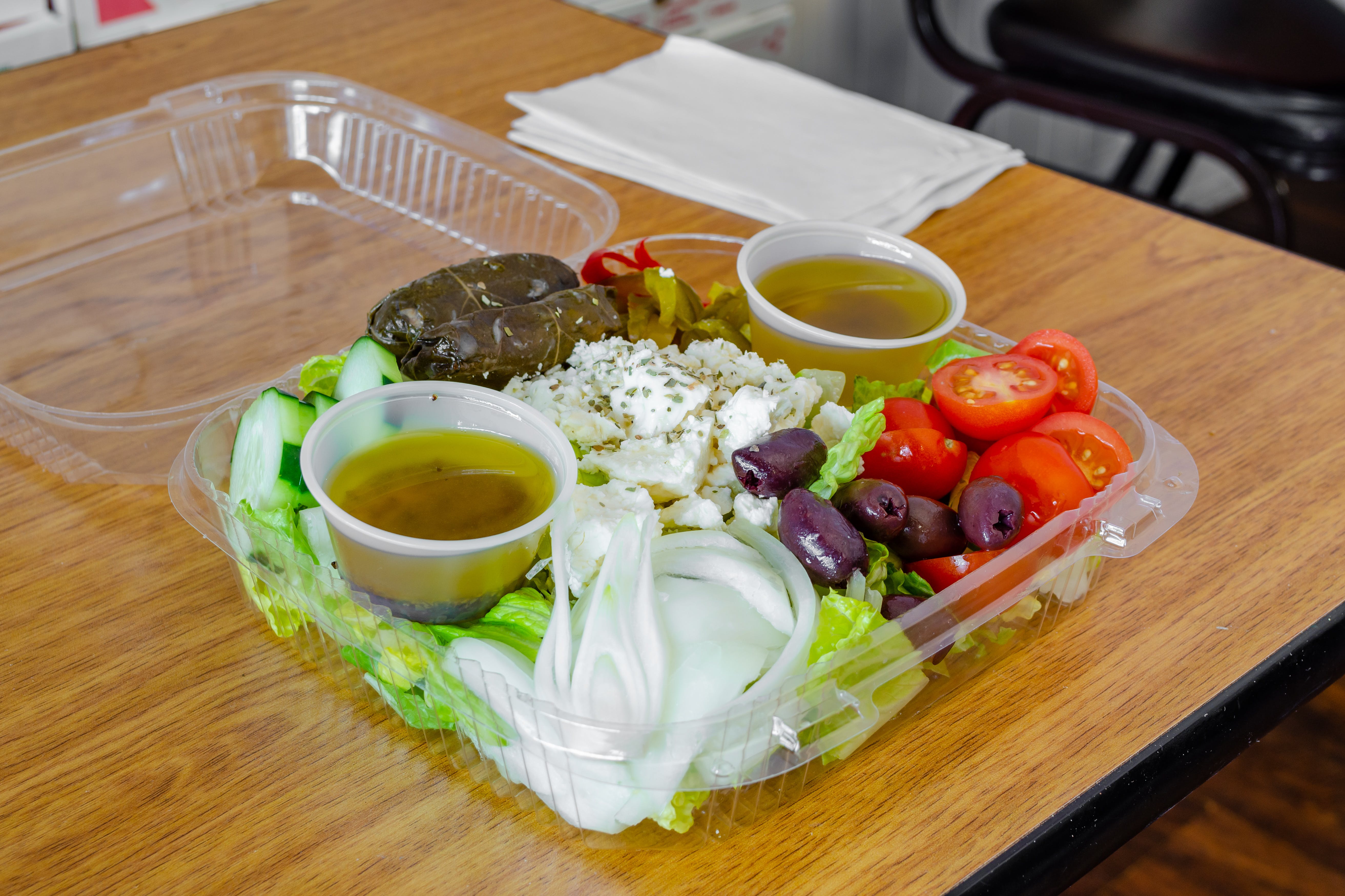Order Greek Salad - Salad food online from Panzini Pizzeria store, Sea Isle City on bringmethat.com