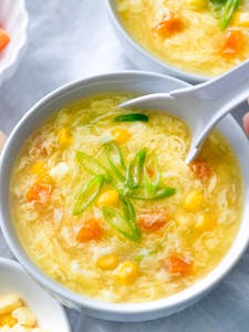Order SP8. Egg Corn Soup food online from Chang Thai & Pho store, North Bend on bringmethat.com