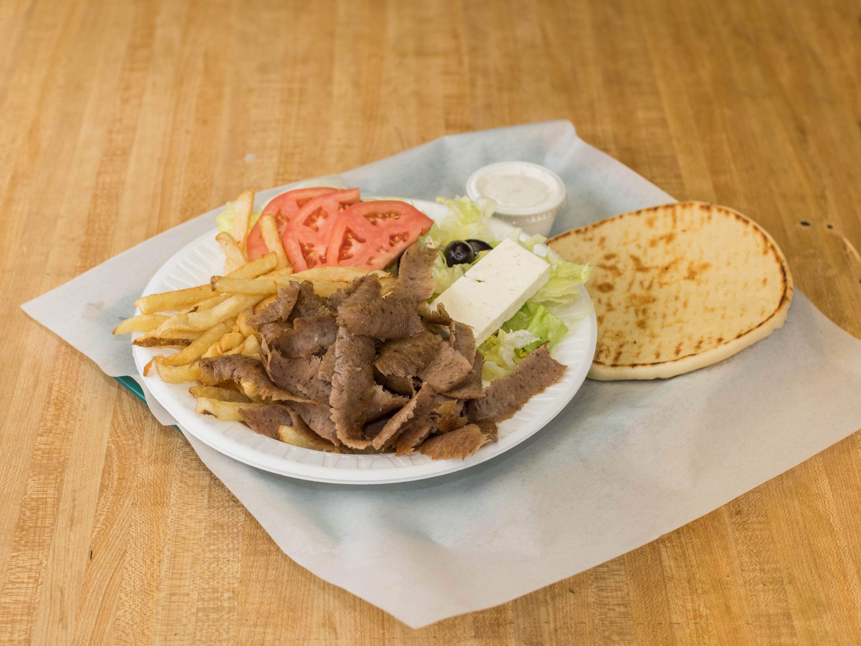 Order Gyros Plate food online from The Winking Dog store, Northlake on bringmethat.com