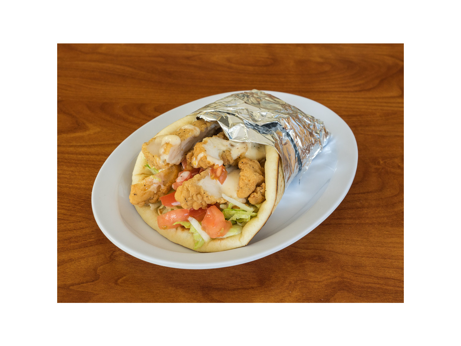 Order Spicy Ranch Chicken Pita food online from Norm Famous Burgers store, Whittier on bringmethat.com