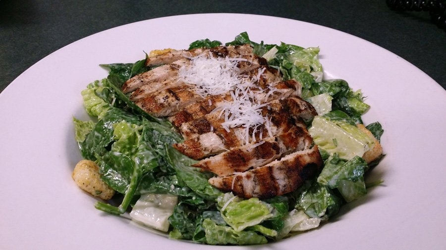 Order *Chicken Caesar Salad food online from The Distillery store, Syracuse on bringmethat.com