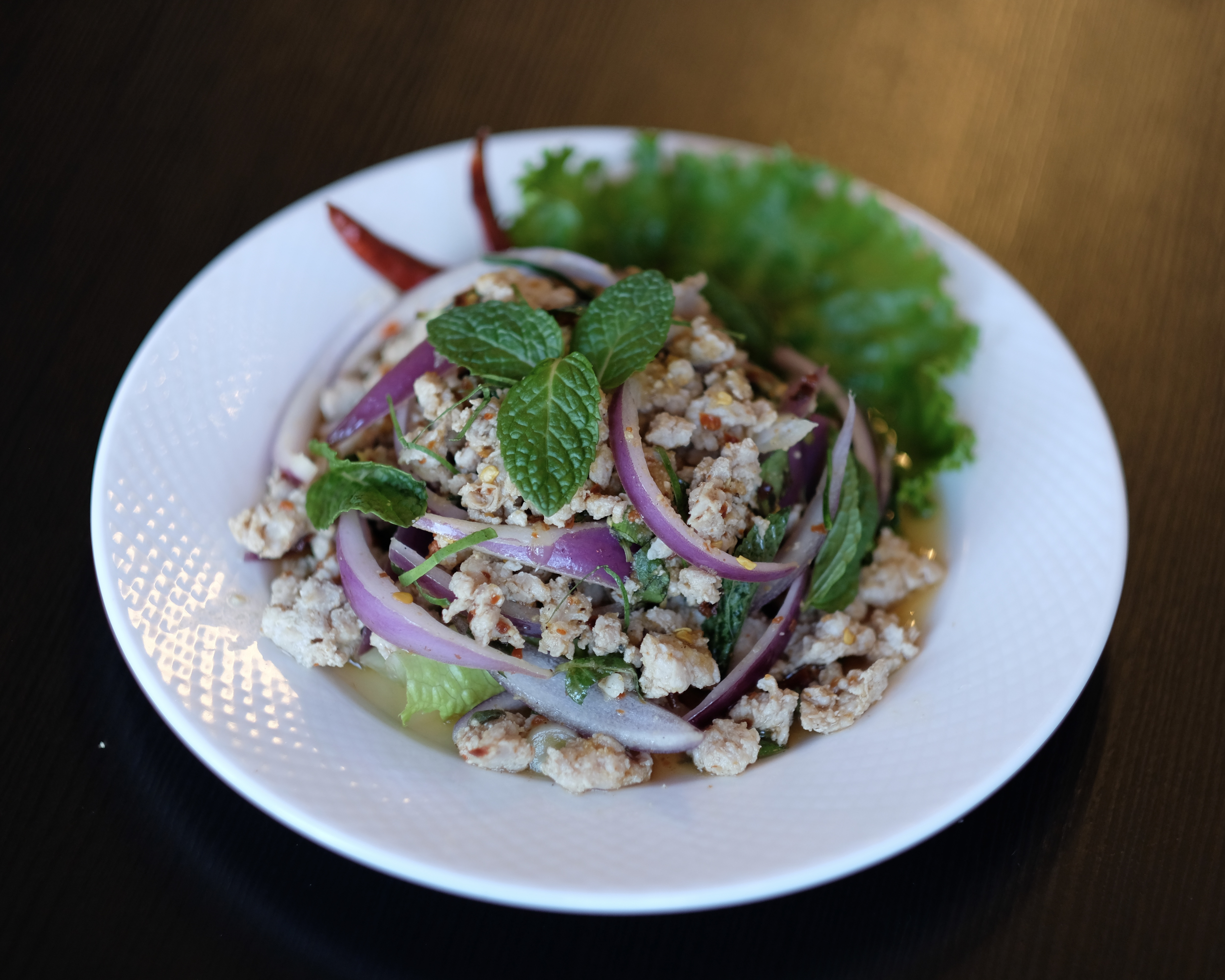 Order Larb  Pork Salad food online from Thai Avenue store, Garden Grove on bringmethat.com