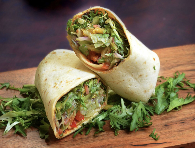 Order Veggie Wrap food online from Mediterranean Grill And Bar store, New York on bringmethat.com