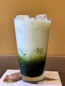 Order Thai Ice Green Tea food online from Tiny Thai store, Cotati on bringmethat.com