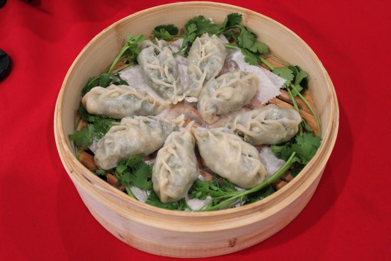Order 8 Piece Steamed Vegetable Dumplings food online from Fengling Restaurant store, Houston on bringmethat.com