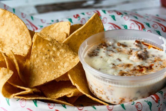 Order Queso Fundido food online from Cilantro Taqueria store, Lakewood on bringmethat.com