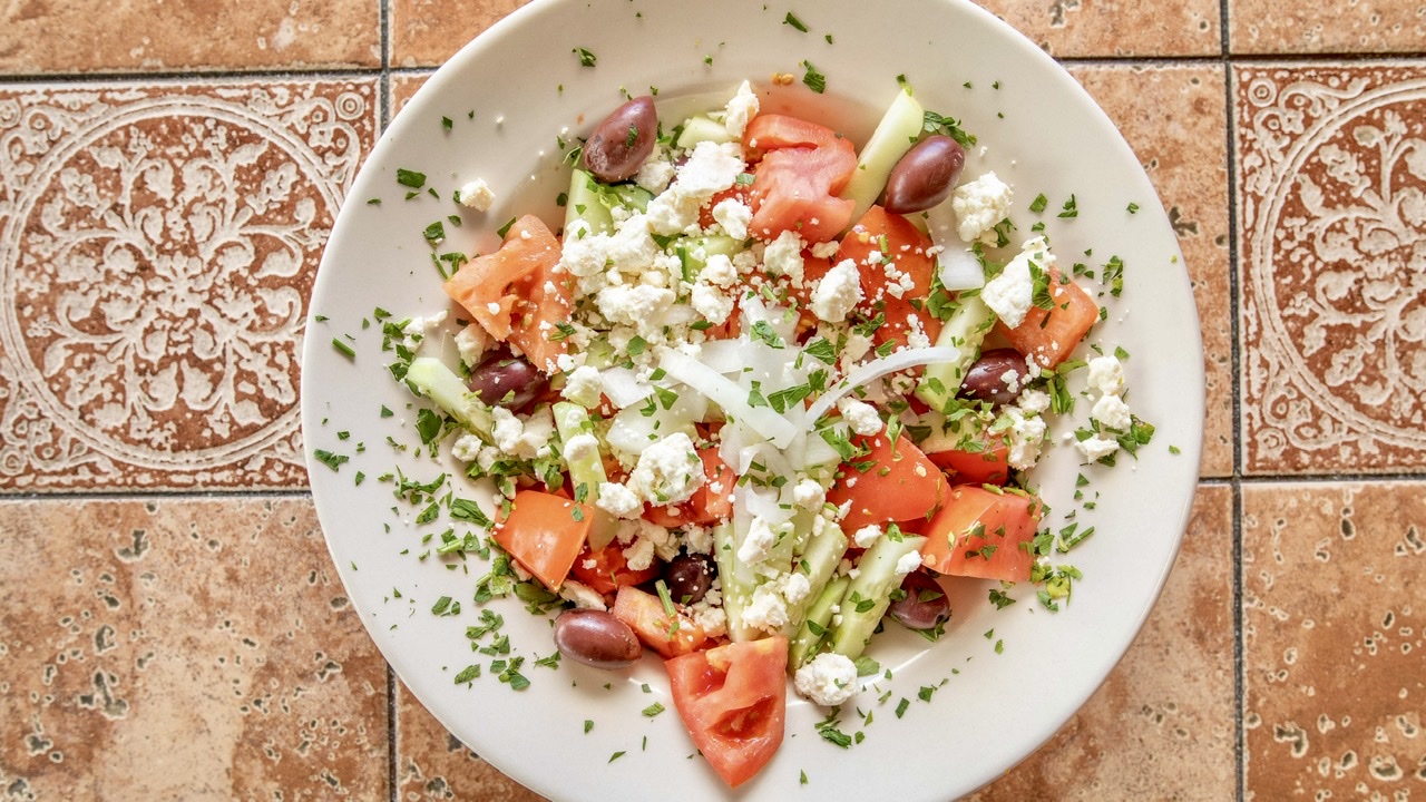 Order Tomato Salad food online from Zorba Greek Eatery store, Wayne on bringmethat.com