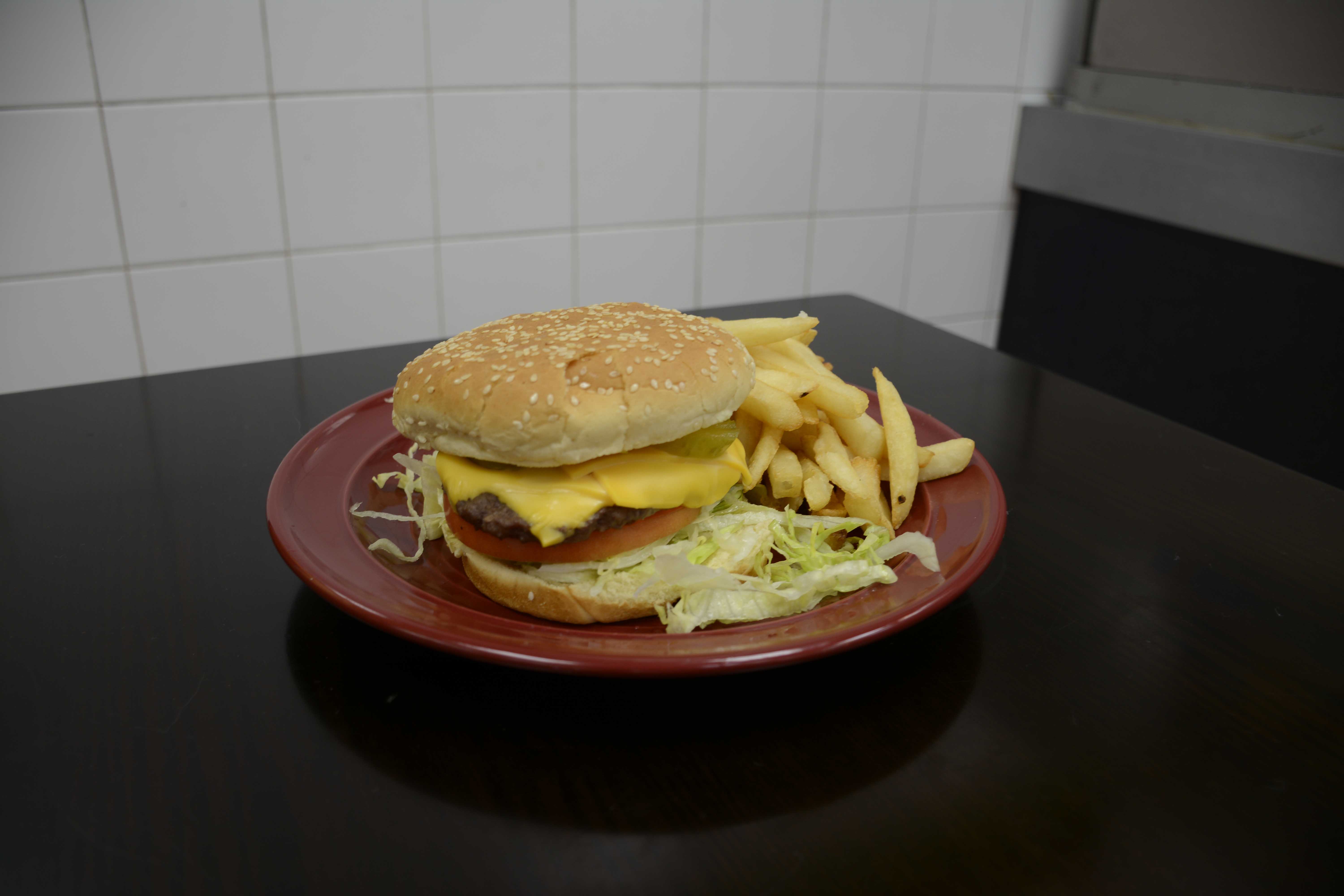 Order Cheeseburger Deluxe food online from Punta Cana Coffee Shop & Restaurant store, Brooklyn on bringmethat.com