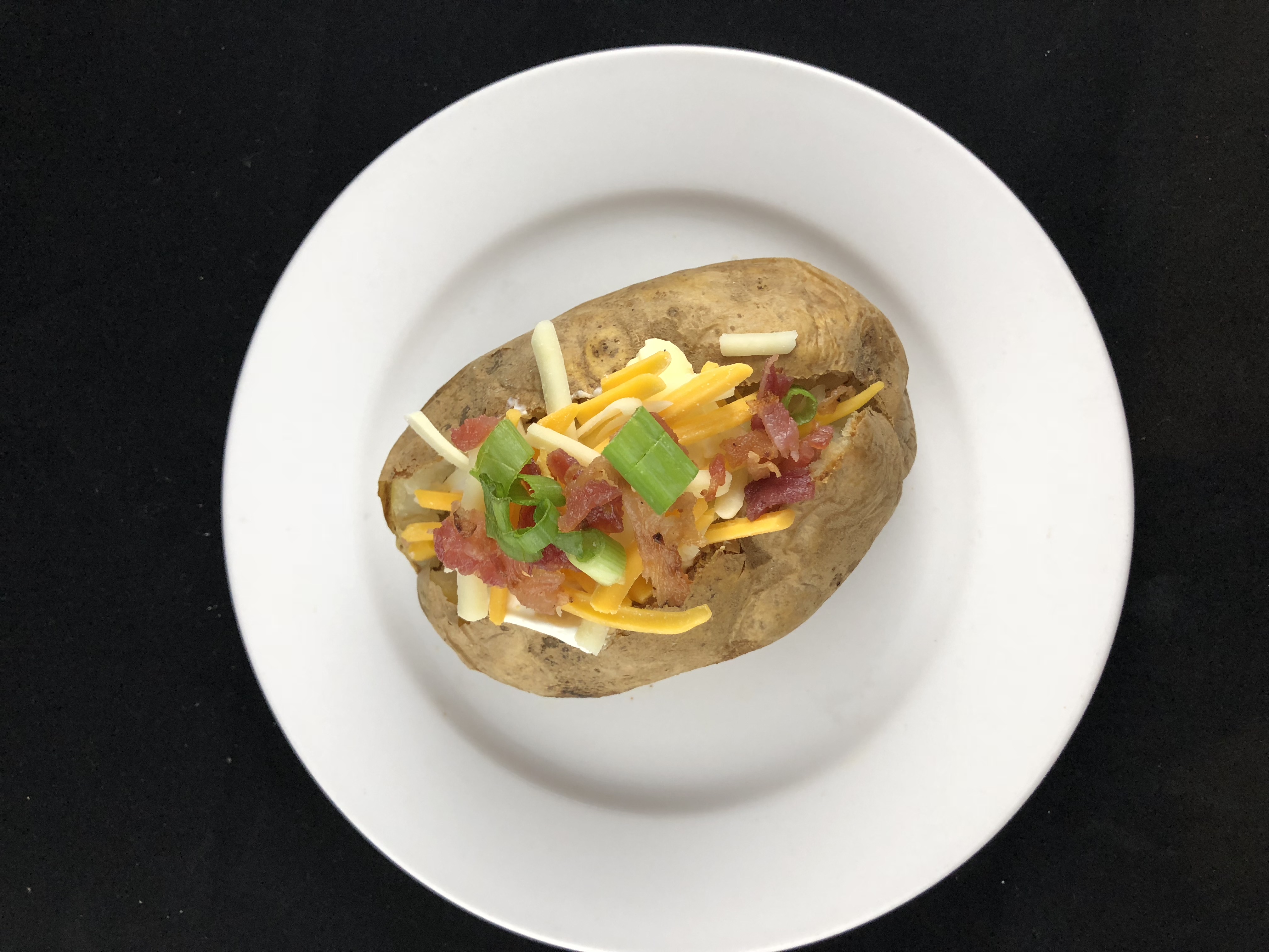 Order Loaded Baked Potato food online from Fatz Cafe store, Lexington on bringmethat.com