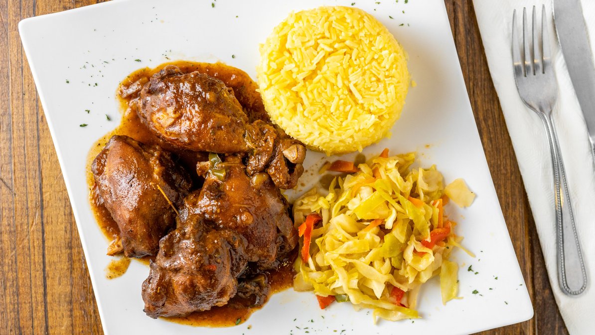 Order Brown Stew Chicken food online from The Island Spot store, Dallas on bringmethat.com