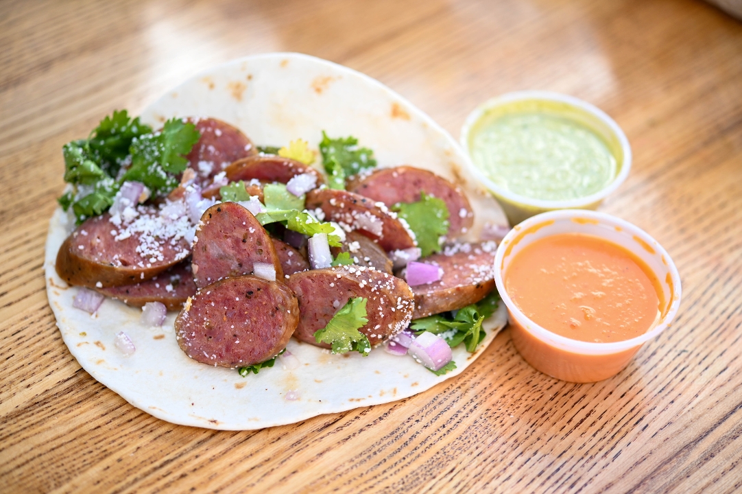 Order Akaushi Sausage Taco food online from Blu's Barbeque & Bbq Catering store, Dallas on bringmethat.com
