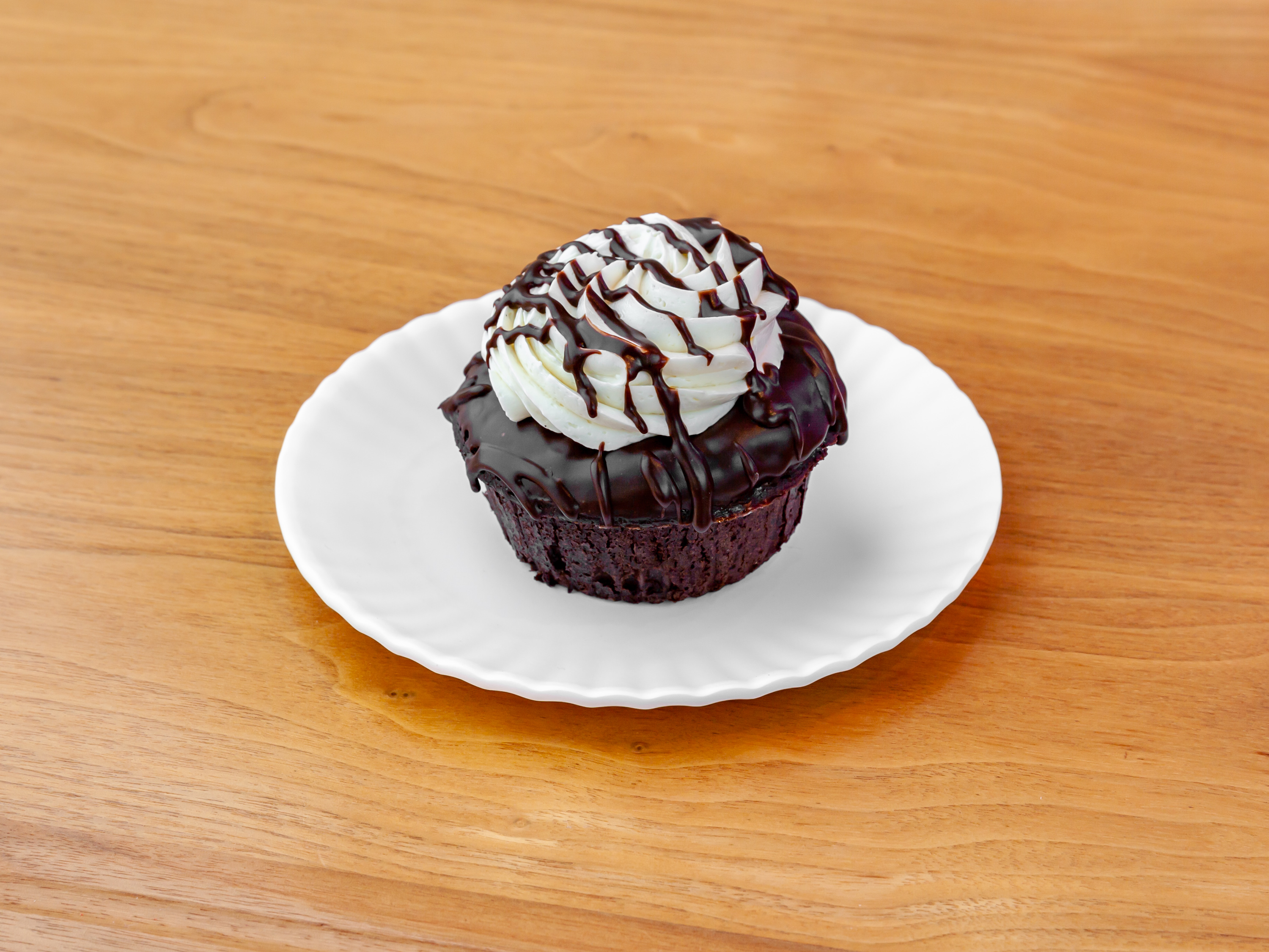 Order Flourless Molten Chocolate Cupcake food online from Molly Cupcakes store, Orland Park on bringmethat.com