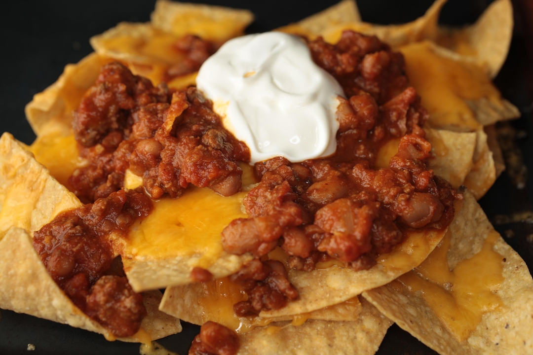 Order Chili Cheese Nachos food online from Freddy Wings & Wraps store, Newark on bringmethat.com