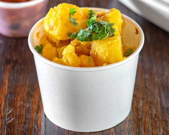 Order Gobhi Aaloo (Cauliflower n Potato)  VEGAN food online from Indigo store, Washington on bringmethat.com
