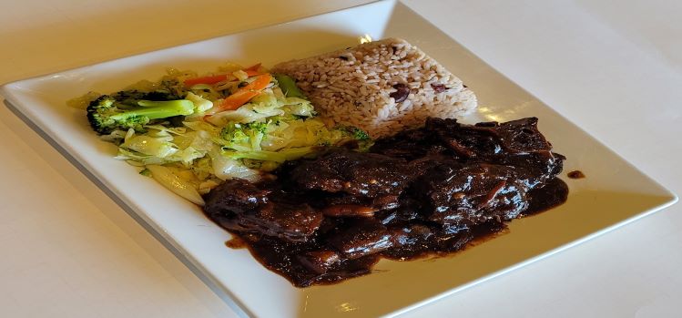 Order Oxtail food online from Paradise Place Jamaican Cuisine store, Las Vegas on bringmethat.com