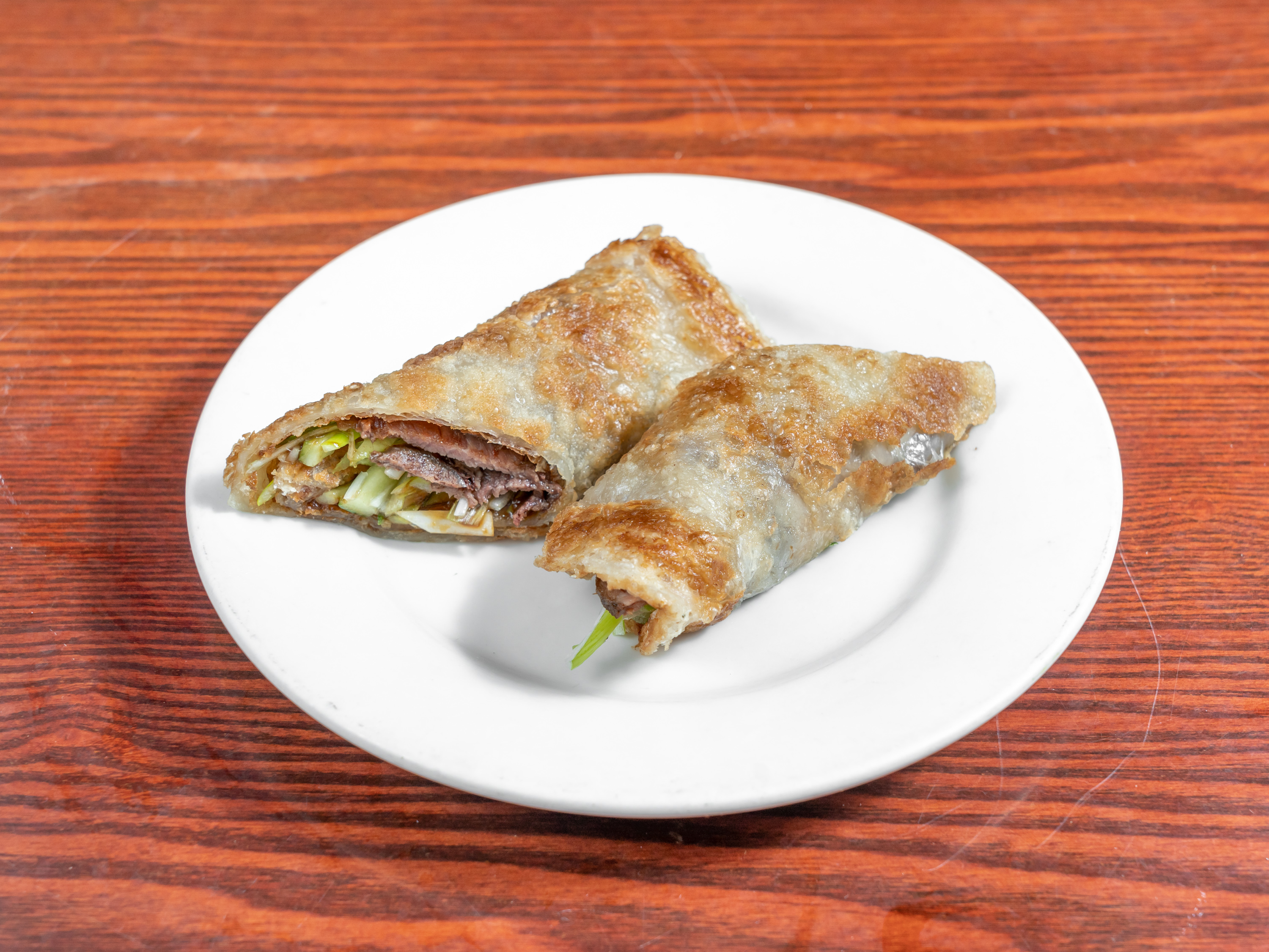 Order 15. Scallion Pancake with Aromatic Beef food online from Jane Restaurant store, New York on bringmethat.com