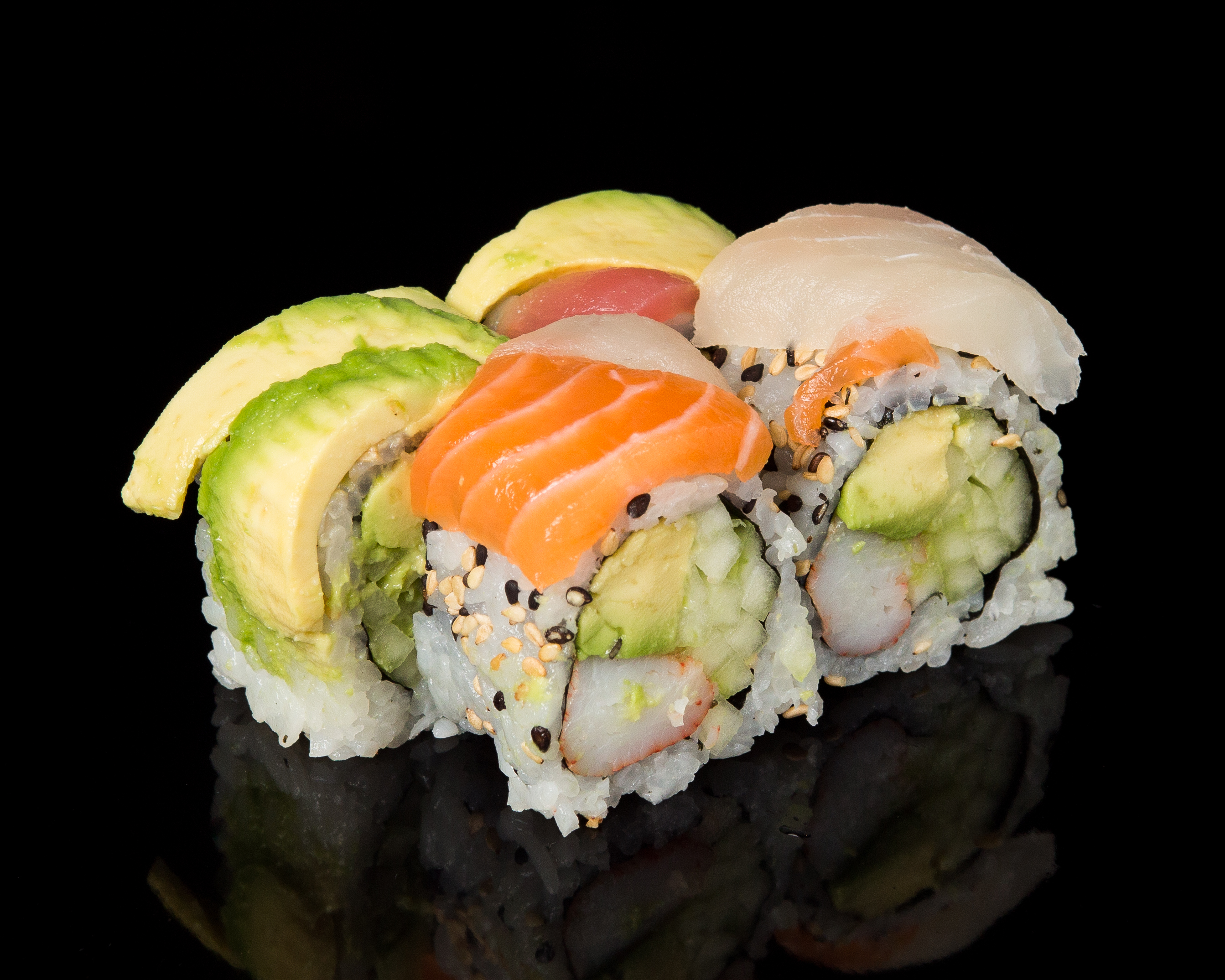 Order 4 Pieces Rainbow Roll food online from Sushi Sakura Express store, Houston on bringmethat.com