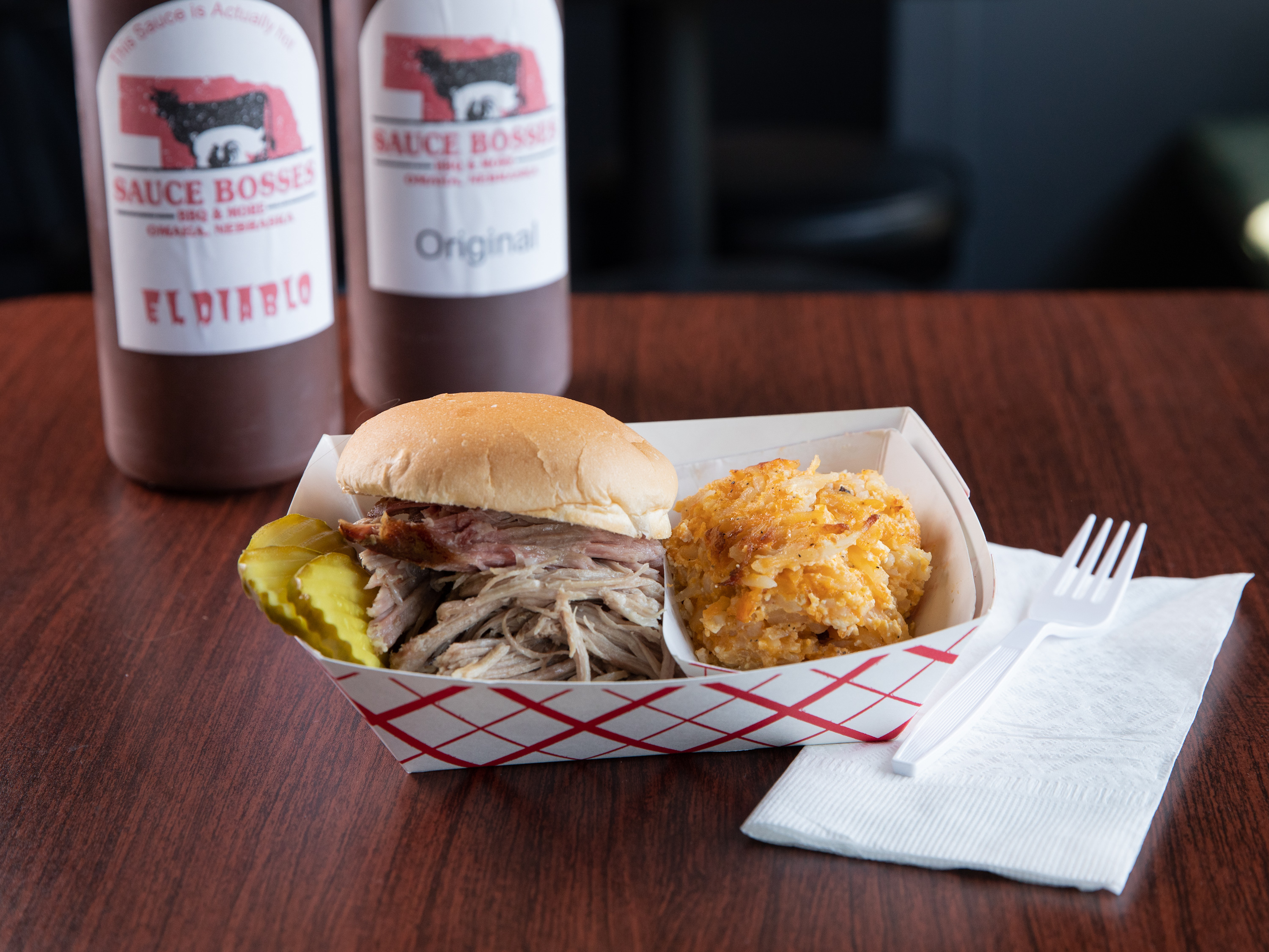 Order Pulled Pork Sandwich food online from Sauce Bosses Bbq store, Omaha on bringmethat.com