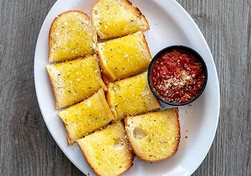 Order Garlic Bread with Marinara food online from Johnny's New York Style Pizza store, Dacula on bringmethat.com
