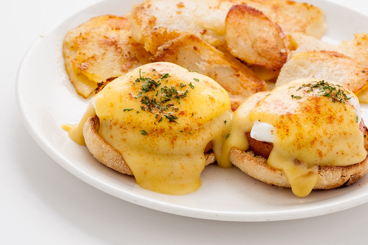 Order Classic Eggs Benedict food online from The Broken Yolk Cafe store, Mission Viejo on bringmethat.com