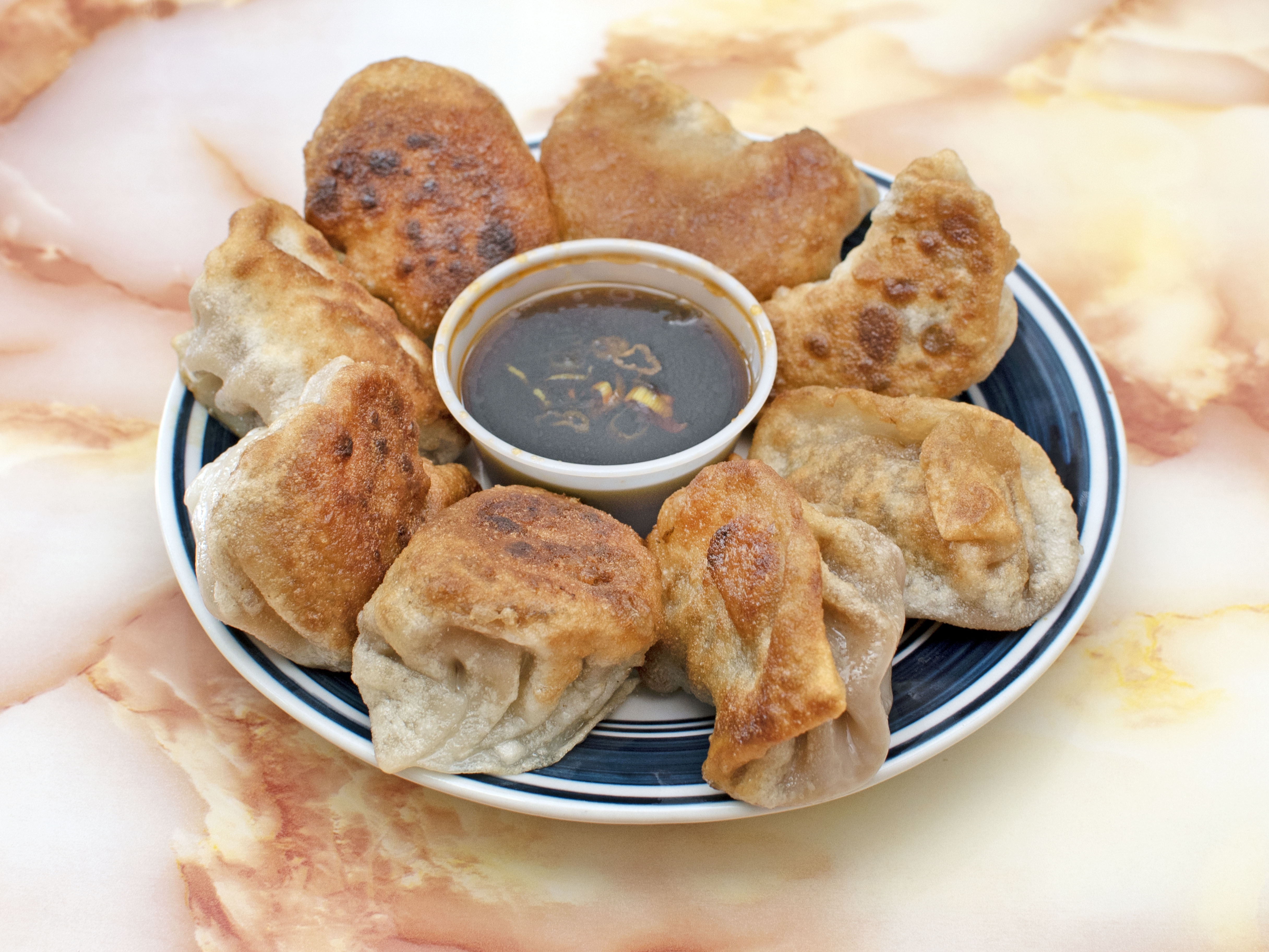 Order 5. Dumplings food online from China Wok store, Winchester on bringmethat.com
