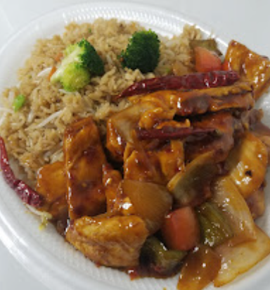 Order General Chicken food online from The Caribbean Restaurant store, Lilburn on bringmethat.com