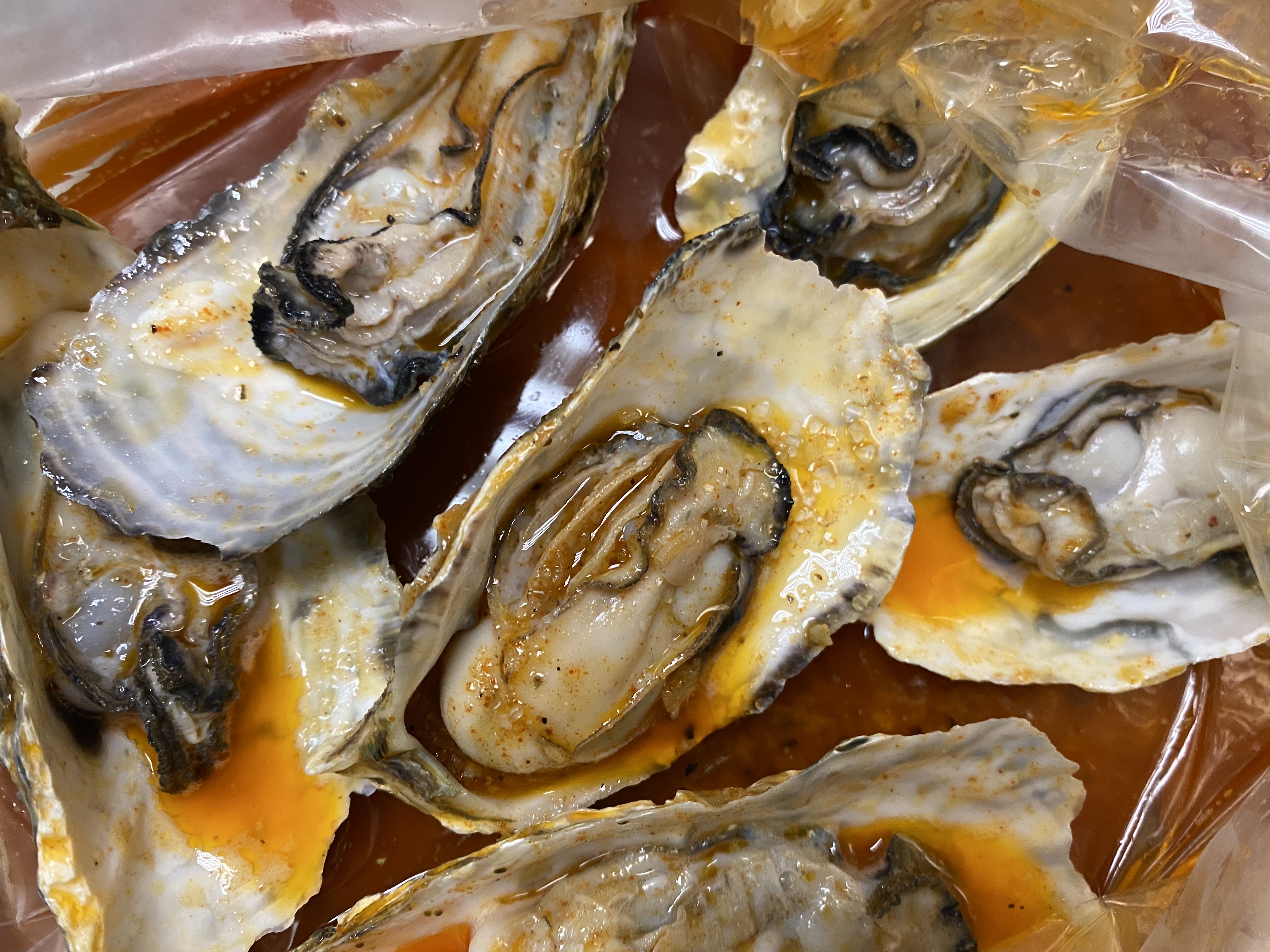 Order Steamed Oysters food online from Ruby's Cajun store, Philadelphia on bringmethat.com