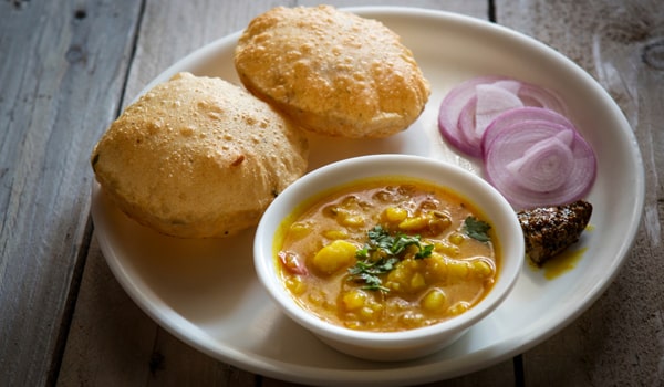 Order Poori Bhaji food online from Madhuram Mirch Masala store, Houston on bringmethat.com