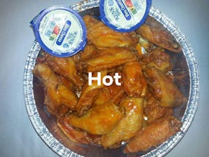 Order Buffalo Wings (8pc food online from Upper Crust Pizzeria & Deli store, Columbia on bringmethat.com