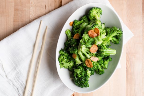 Order broccoli with garlic food online from Dan Modern Chinese store, Playa Vista on bringmethat.com