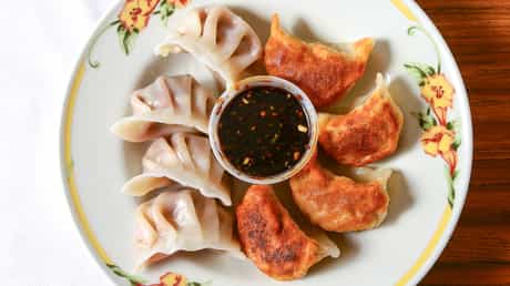 Order 11. 7 Piece Potstickers ( 7 ） food online from Hunan House store, Centralia on bringmethat.com