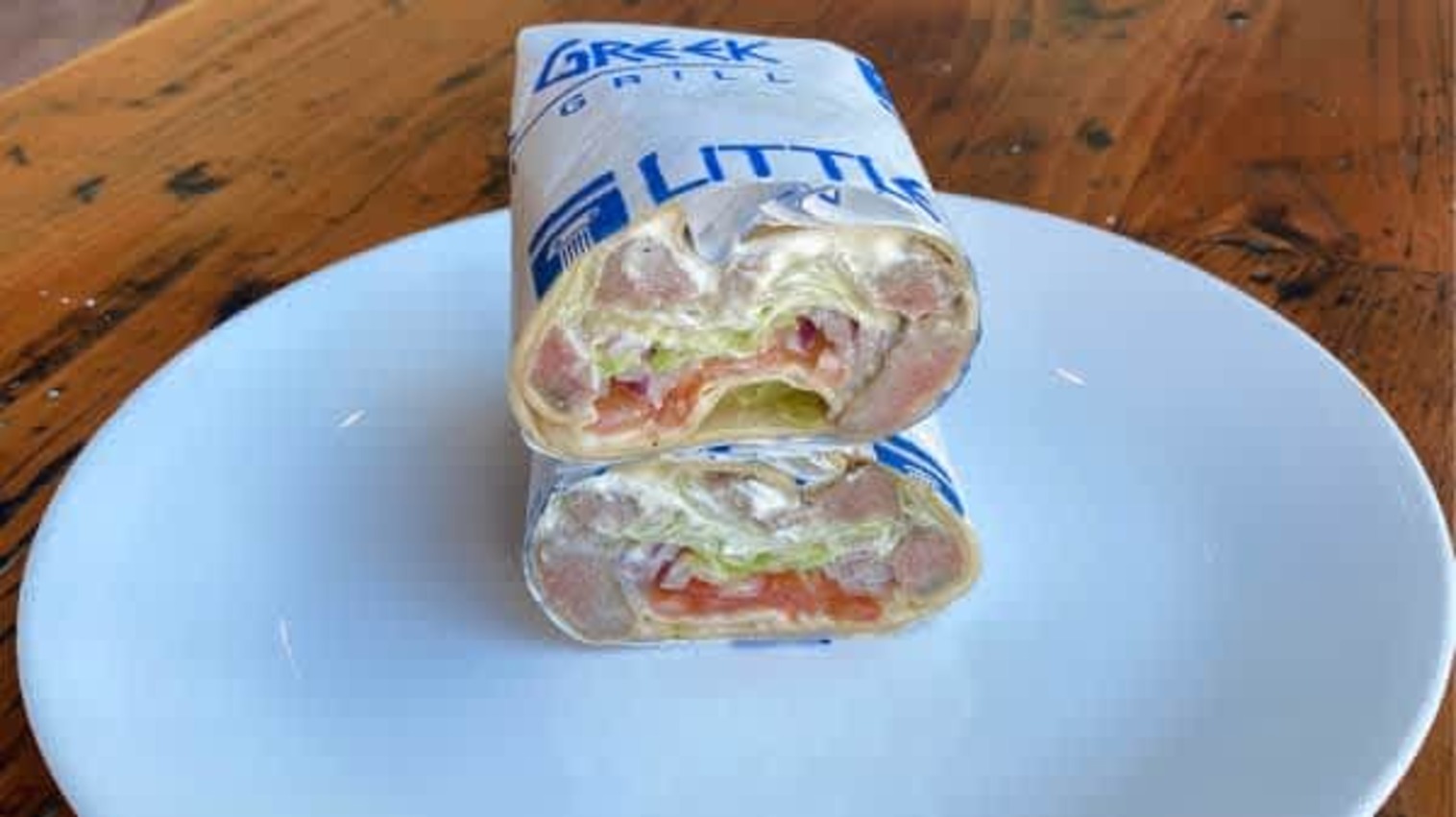 Order STEAK WRAP food online from Little Greek Fresh Grill store, Youngstown on bringmethat.com