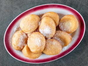 Order A10. Fried Sweet Biscuits (10) food online from Lucky Rice 888 store, Dallas on bringmethat.com