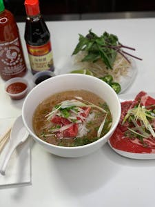 Order Pho Rib Eye food online from Banh Mi Express store, Brentwood on bringmethat.com