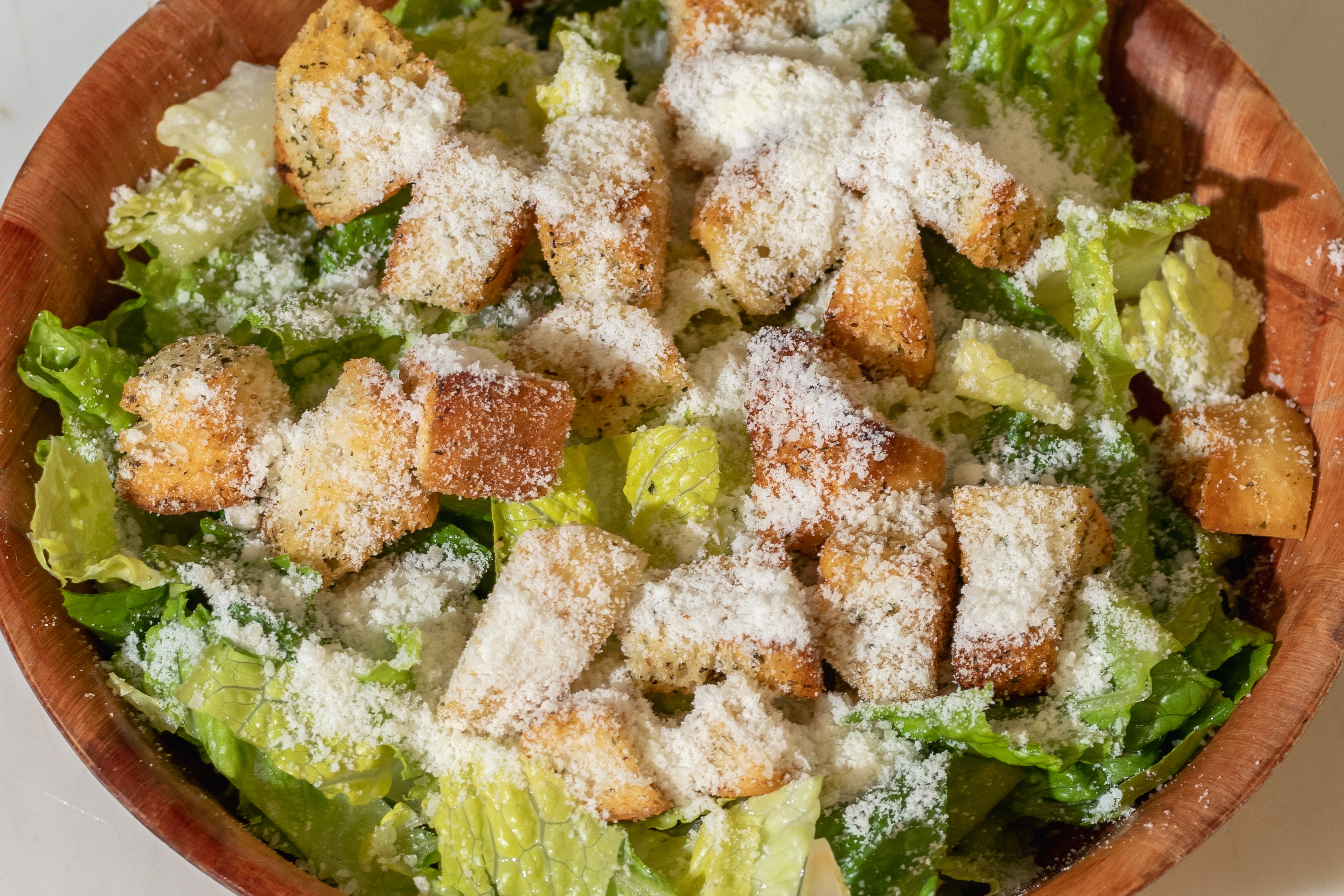 Order Caesar Salad food online from Tortorice's Pizza & Catering store, Chicago on bringmethat.com