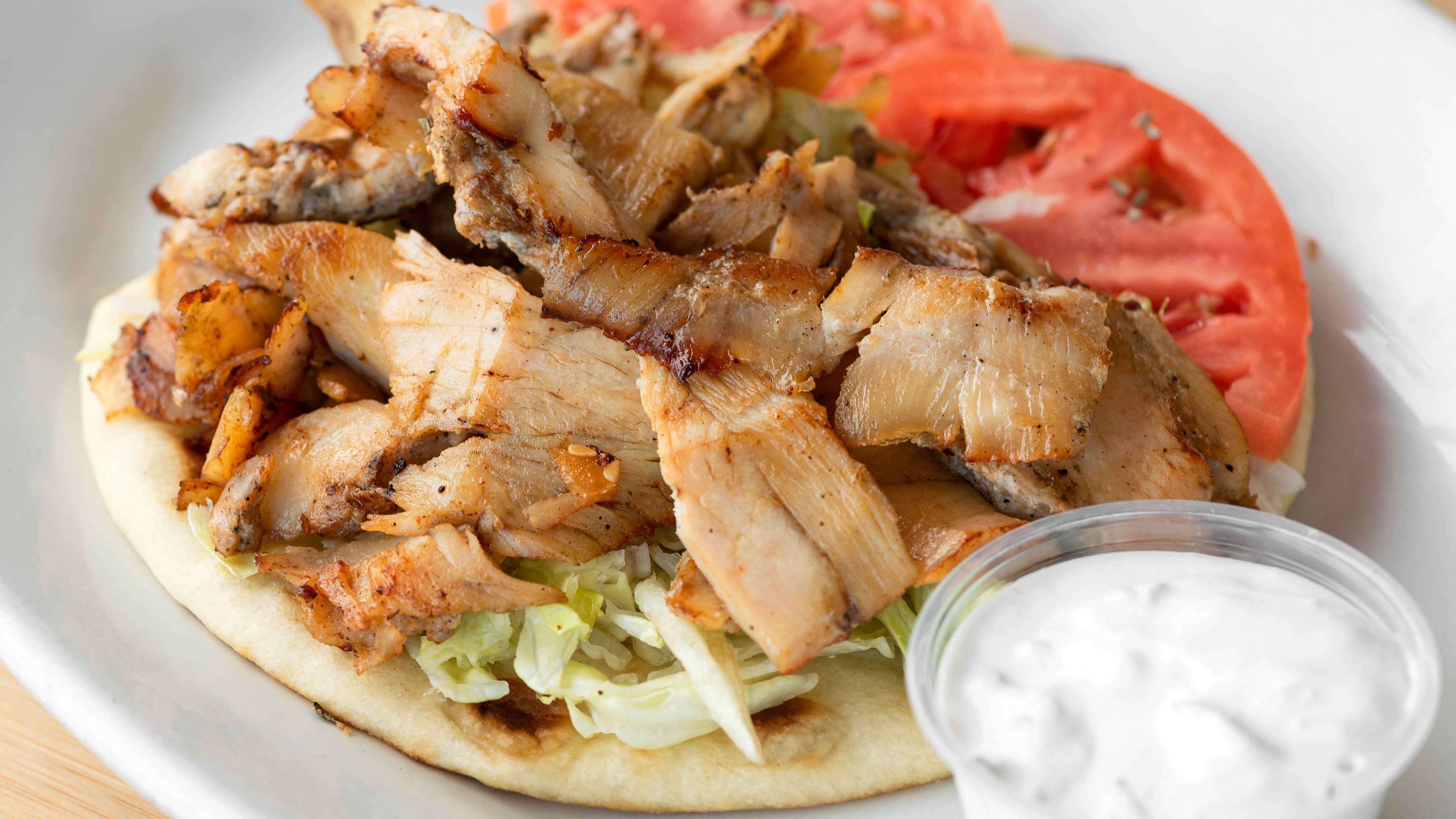 Order Chicken Gyros Sandwich food online from Hub's store, Chicago on bringmethat.com