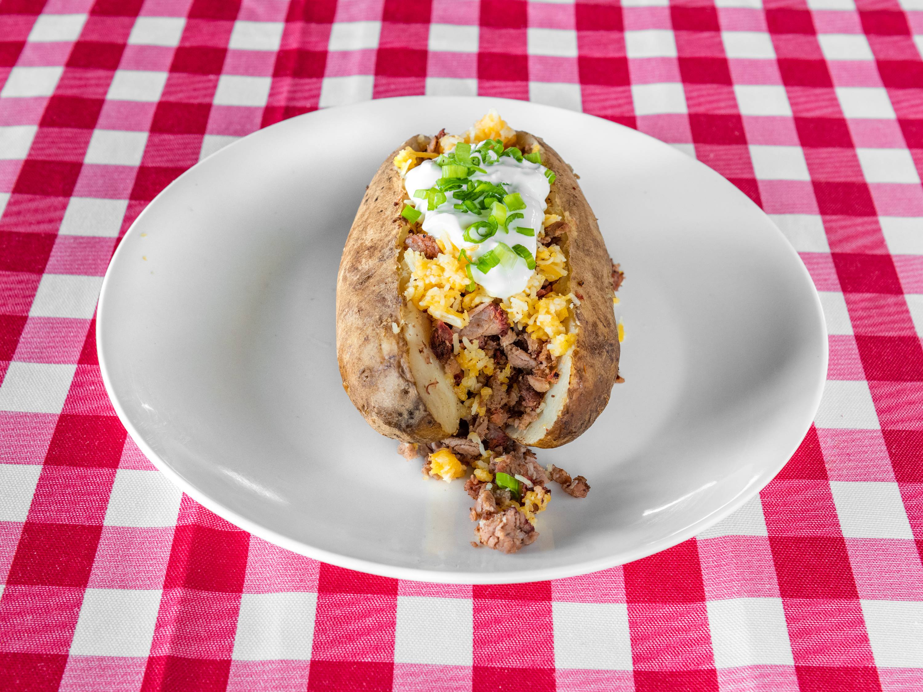 Order Loaded Brisket Baked Potato food online from Shaws Country Kitchen store, Round Rock on bringmethat.com