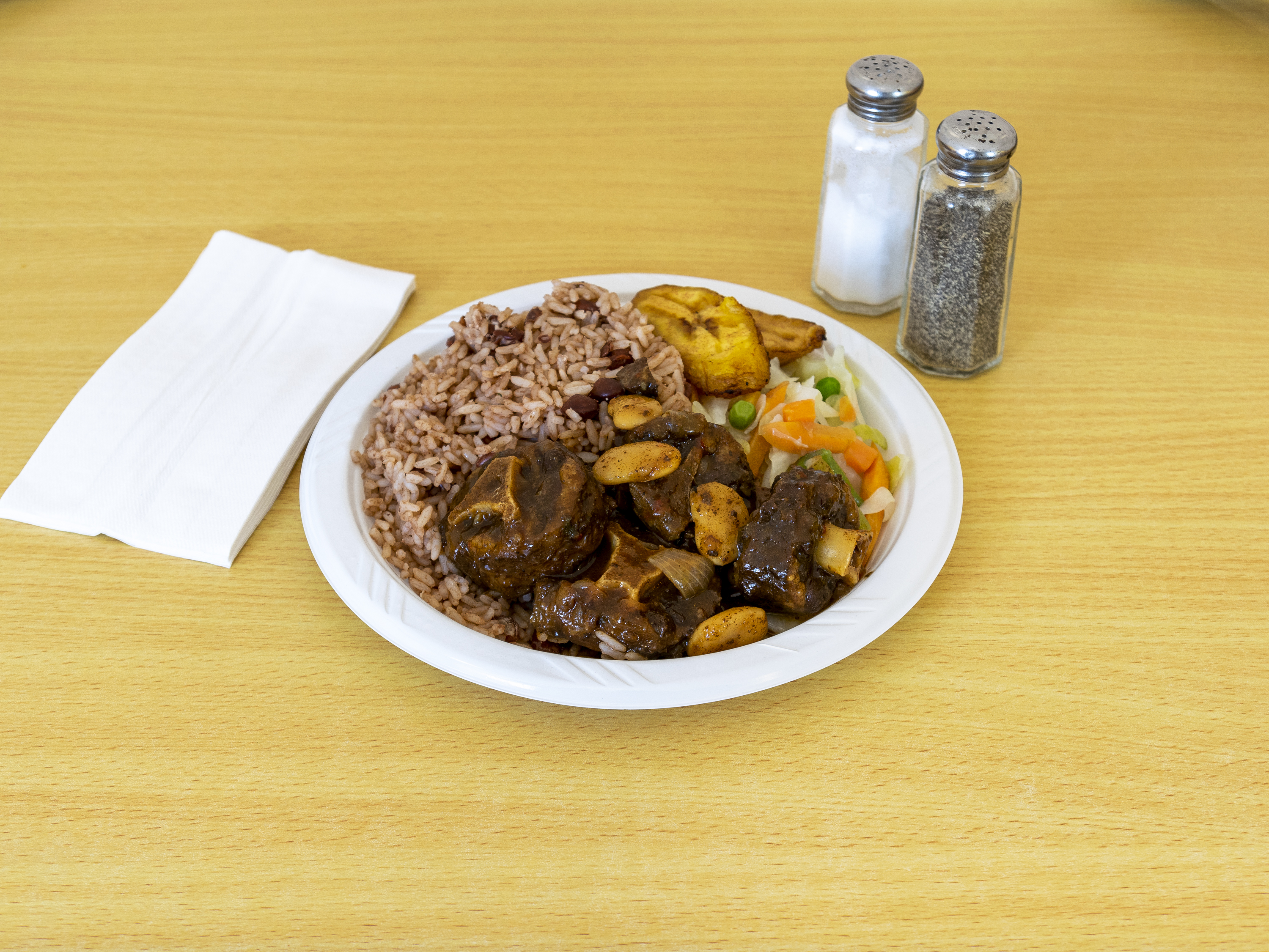 Order Oxtail food online from Island Spice Restaurant, LLC store, Spring Valley on bringmethat.com