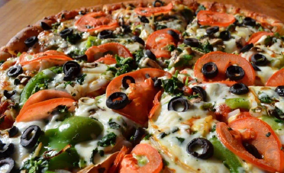 Order Vegetarian Pizza - Big Slice food online from GoodFellas Pizzeria store, San Francisco on bringmethat.com